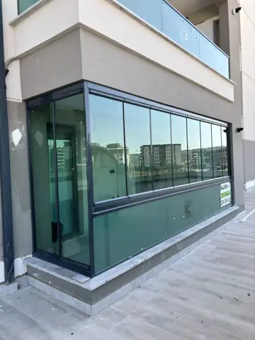 Bursa katlanır cam balkon uygulaması, dikey profilsiz görünüm